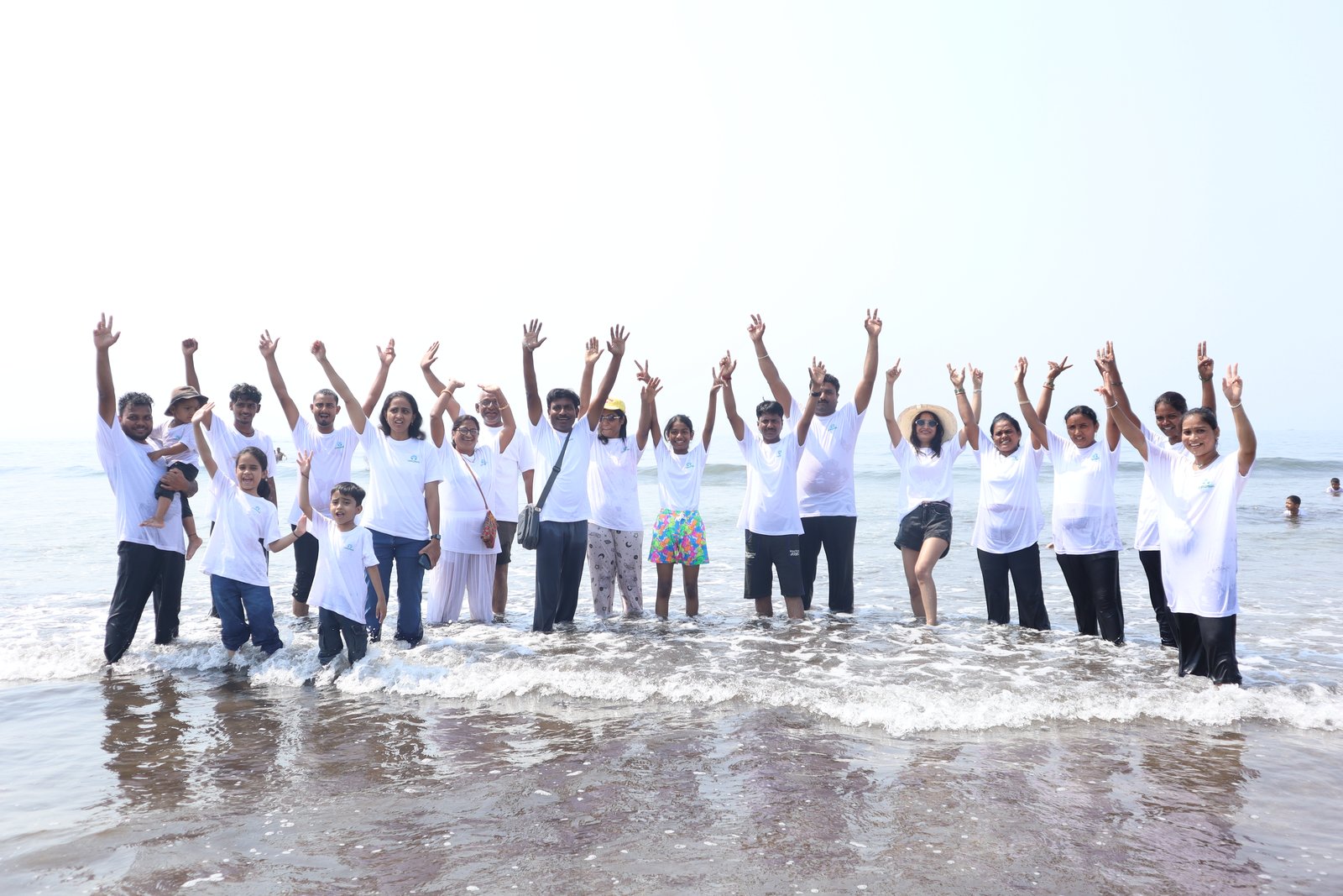 Continual team enjoying a beach outing together