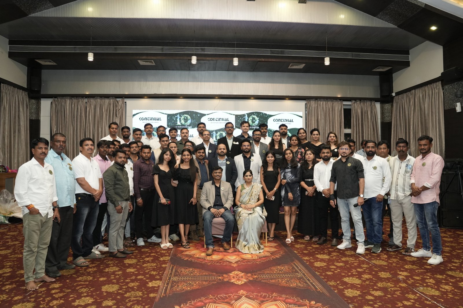 Continual team together at a company celebration
